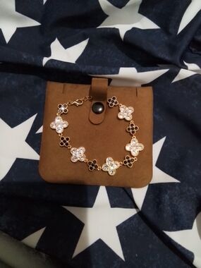 Gold-tone Clover Link Bracelet with Black and Clear Accents